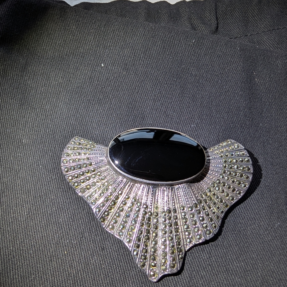 Elegant Black and Silver Brooch